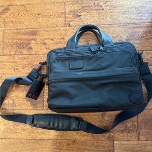 TUMI Black Briefcase with Red Accents